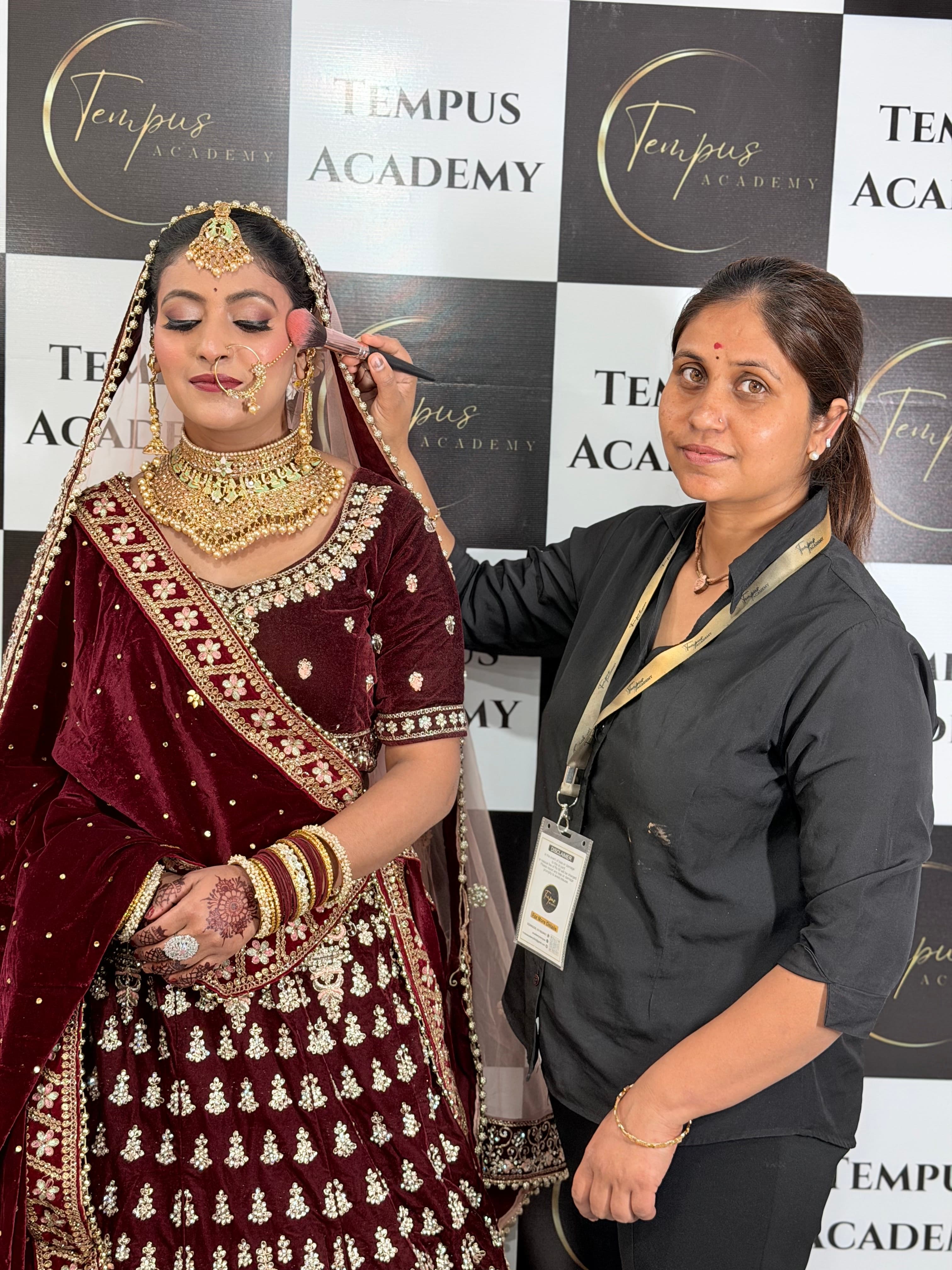 Applying makeup on a model's face